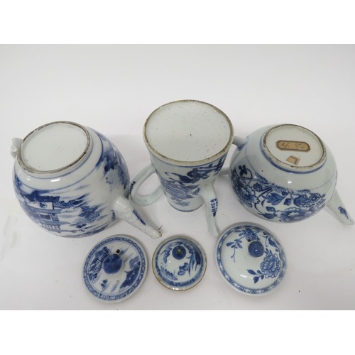 6026A - 18th Century blue and white Oriental export teapots and chocolate pot, two with floral decoration th... 