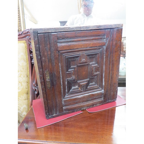 6049 - 18th Century oak cupboard of small proportions with geometric detail, 37cm x 36cm x 17cm