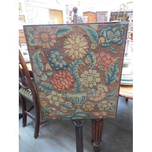 6105 - A sweet Georgian mahogany face fire-screen with original floral display tapestry, 109cm tall