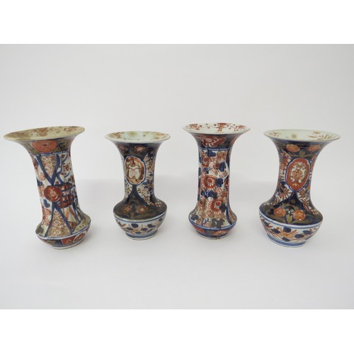 6019 - Four similar Japanese Imari vases, and four others, largest 15.5cm tall