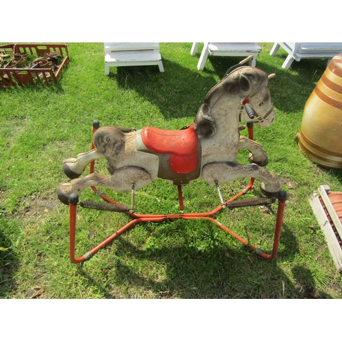 5557 - A 'Mobo' tinplate rocking horse and a Webb child's mower