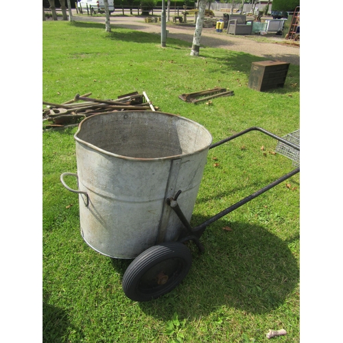 5588 - A galvanised bowser on wheeled frame