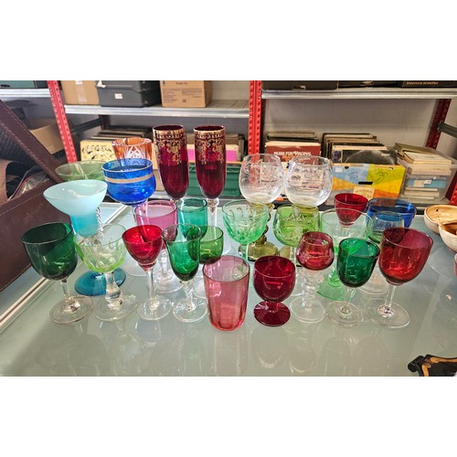 1384 - A collection of miscellaneous drinking glasses, various ages and sizes, cranberry, Bristol blue and ... 