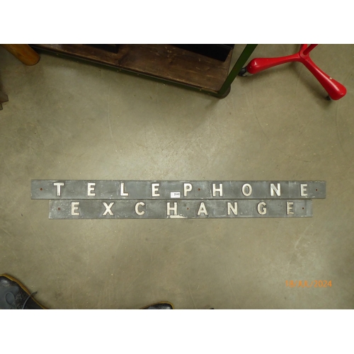 2040 - A telephone exchange sign