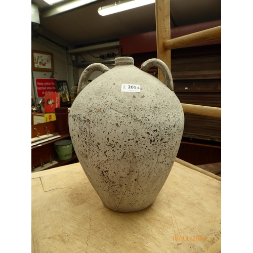 2054 - A twin handled terracotta bottle a/f