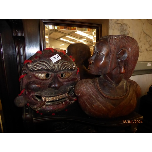 2131 - A tribal mask and a carved bust