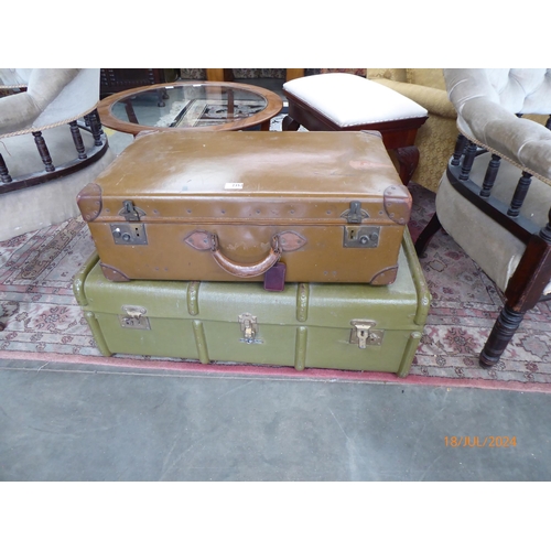 2352 - A green painted travelling trunk together with a leather effect suitcase