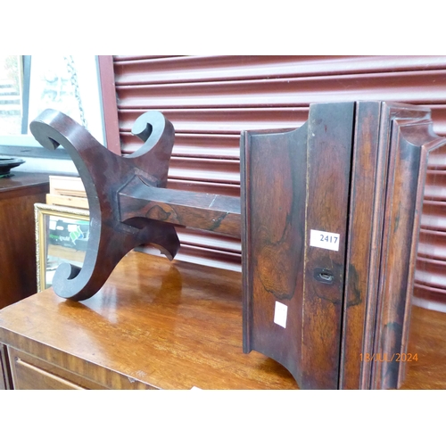 2417 - A 19th Century rosewood teaboy, one castor, a/f