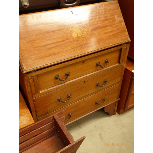 2451 - An Edwardian mahogany bureau, the fall front inlaid with marquetry over a three drawer front, raised... 