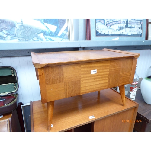 2456 - A 1960s sewing box stool