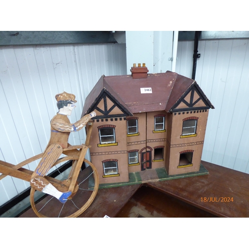 2462 - A dolls house and roll along toy