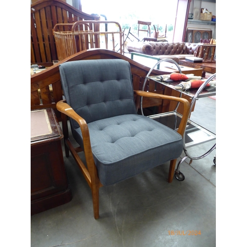 2484 - A reproduction Danish design armchair