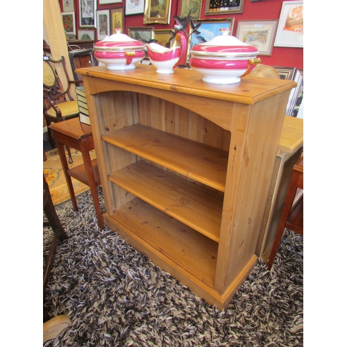 1318 - A natural pine Victorian style height adjustable bookshelf on a plinth base, 91cm tall x 86cm wide x... 