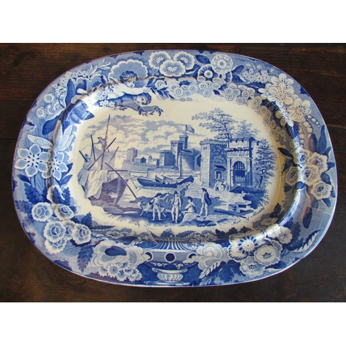 1327 - A Victorian blue and white serving plate with cherubs and Italian scene, 38cm long