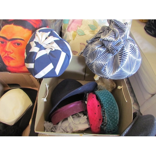 1378 - Two boxes of ladies' hats and two cushions including Freda Khalo image