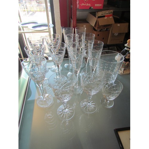 1398 - Six cut glass champagne flutes, five matching wine glasses, two crystal glass wine glasses and a hea... 