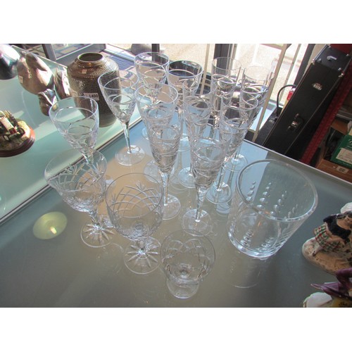 1398 - Six cut glass champagne flutes, five matching wine glasses, two crystal glass wine glasses and a hea... 