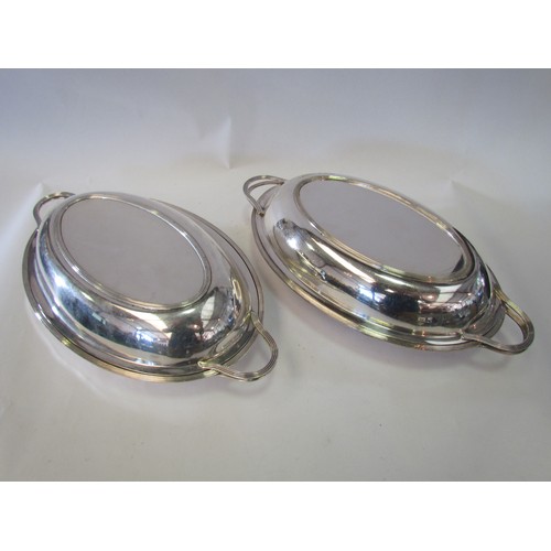 1403 - A George V silver oval two-handled serving dish with reeded edges. Sheffield 1911. A matching plated... 