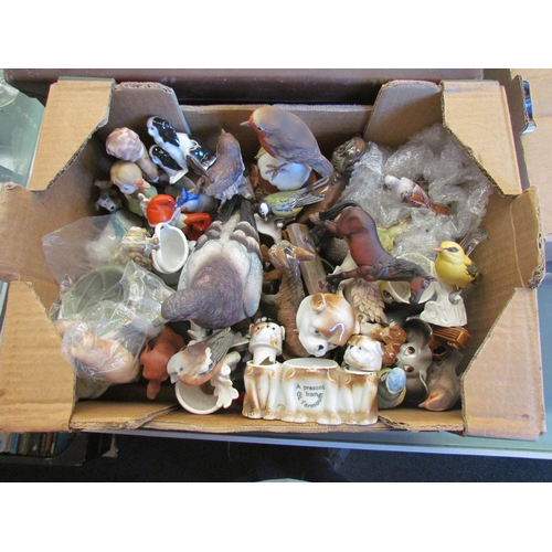 1412 - A box of miscellaneous ceramic and glass animal and bird figures to include Goebel finches, Victoria... 