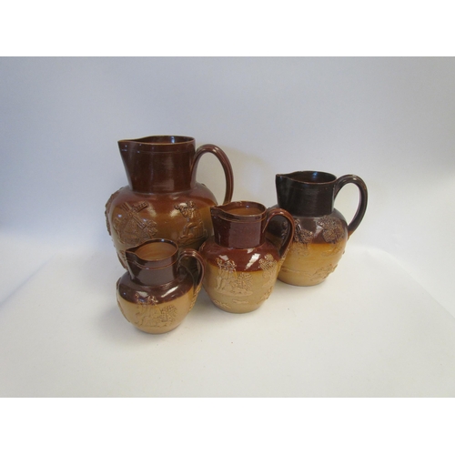 1425 - Four harvest jugs, 22cm, 17cm, 14.5cm and 11cm tall