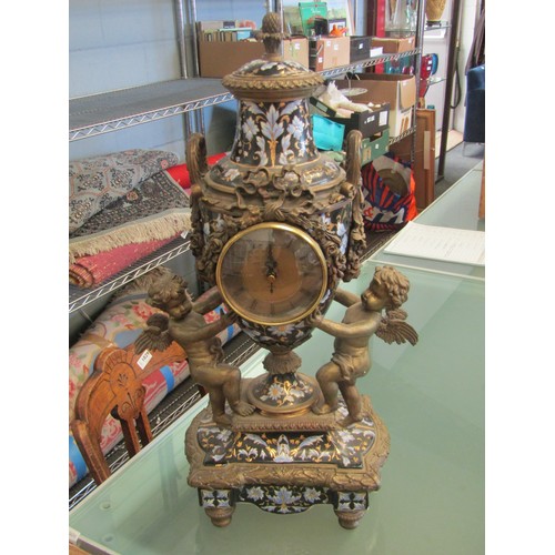 1005 - A 20th Century brass mantel clock in 18th Century style. Ornate champagne levée enamel decoration. Q... 