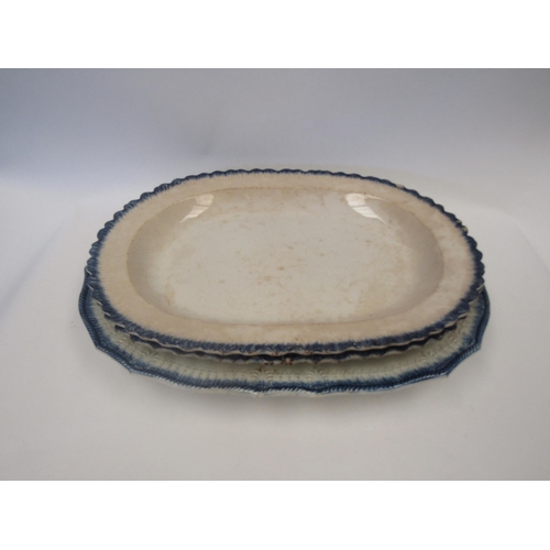 1654 - Three early 19th Century blue feather edge serving plates, chips to rims, longest 41.5cm