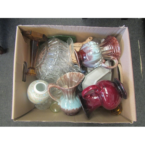 1673 - A box containing ceramics and glassware including German glazed jugs, glass bowls and vases