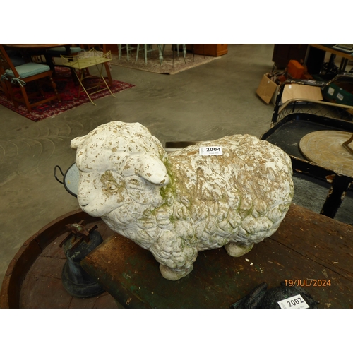 2004 - A sheep garden ornament, 42cm long