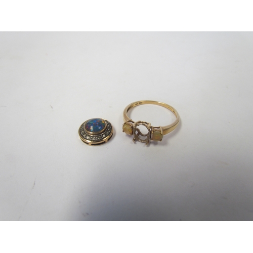 1038 - A 9ct gold ring shank, centre stone missing, and a diamond and opal pendant. (a/f) 2.9g total.