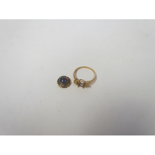 1038 - A 9ct gold ring shank, centre stone missing, and a diamond and opal pendant. (a/f) 2.9g total.