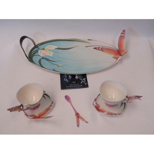 1026 - A Franz porcelein butterfly tray. A pair of matching Franz butterfly cups and saucers, one with spoo... 