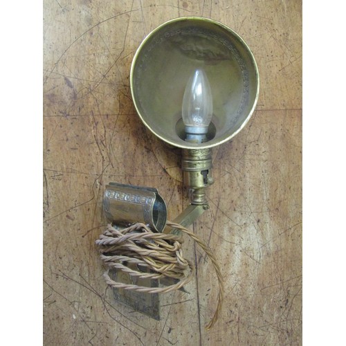 1069 - An early 20th Century brass Adjusto-Lite.