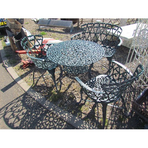 1049 - A 20th Century cast aluminium patio set in the Victorian style, comprising a circular two-tier table... 