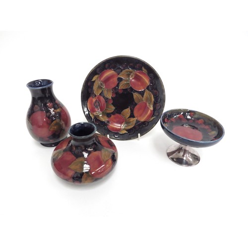 6651 - Four pieces of Moorcroft Pomegranate pattern pieces, squat form vase 8cm, plate 16.5cm diameter, sma... 