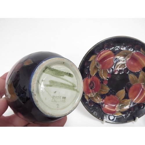 6651 - Four pieces of Moorcroft Pomegranate pattern pieces, squat form vase 8cm, plate 16.5cm diameter, sma... 