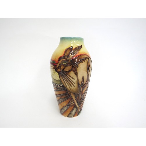 6619 - A Moorcroft vase designed by Kerry Goodwin depicting Hares in ploughed field, 56/75, 21cm tall