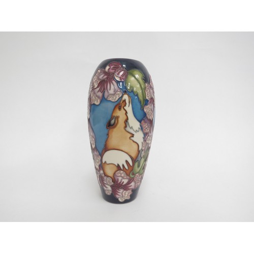 6620 - A Moorcroft Trial pattern vase dated 22.10.08 depicting Foxes amongst Foxgloves, 19cm tall