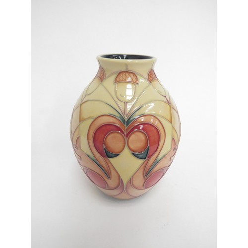 6622 - A Moorcroft vase designed by Nicola Slaney depicting Red Squirrels and acorns, 13cm tall