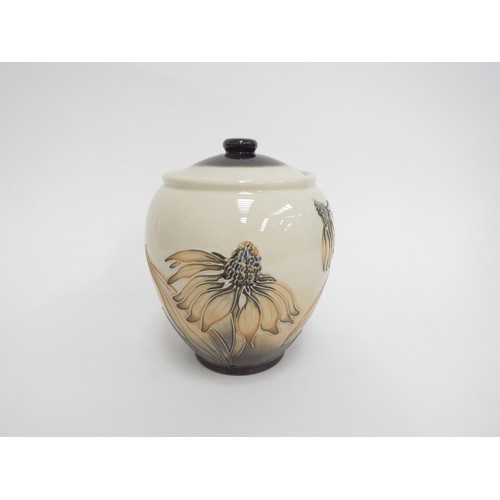 6621 - A Moorcroft Cone Flower pattern ginger jar designed by Anji Davenport, 15cm tall