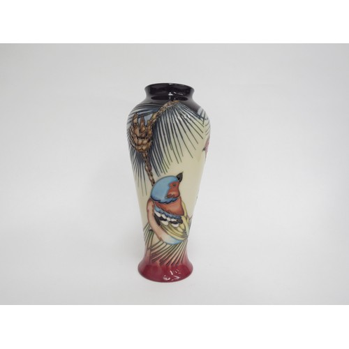 6616 - A Moorcroft Inglewood pattern vase designed by Philip Gibson, 21cm tall