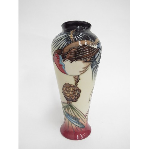 6616 - A Moorcroft Inglewood pattern vase designed by Philip Gibson, 21cm tall