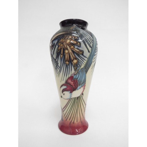 6616 - A Moorcroft Inglewood pattern vase designed by Philip Gibson, 21cm tall