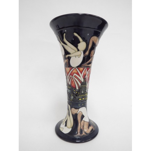 6611 - A Moorcroft The Athletes pattern vase designed by Kerry Goodwin, 21cm tall