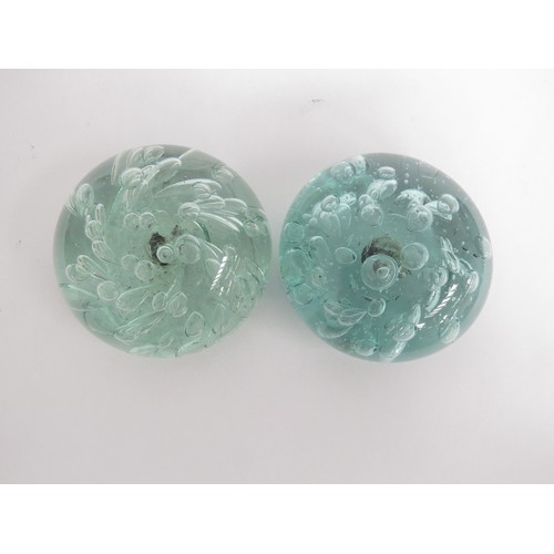 6608 - Two flat bubble glass advertising paperweights, 