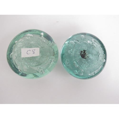 6608 - Two flat bubble glass advertising paperweights, 