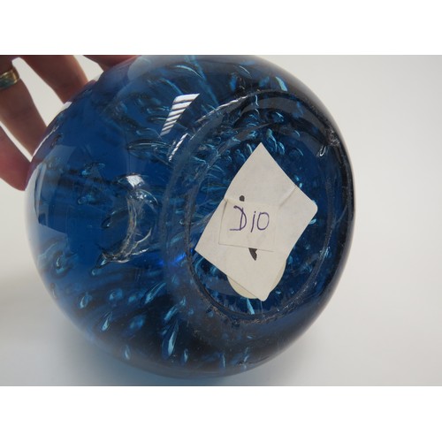 6604 - A large blue dump glass doorstop with bubble inclusions, 19cm tall