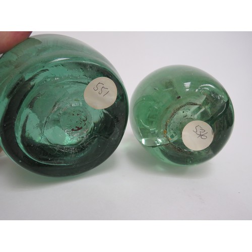 6606 - Two Victorian green glass dumps both with multiple flower inclusions, tallest a/f. 12.5cm