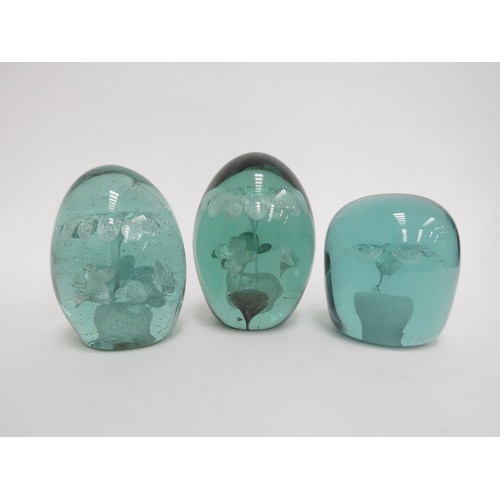 6589 - Three Victorian green glass dumps with foil flower inclusions, tallest 12cm