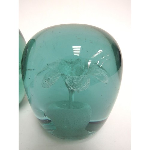 6589 - Three Victorian green glass dumps with foil flower inclusions, tallest 12cm