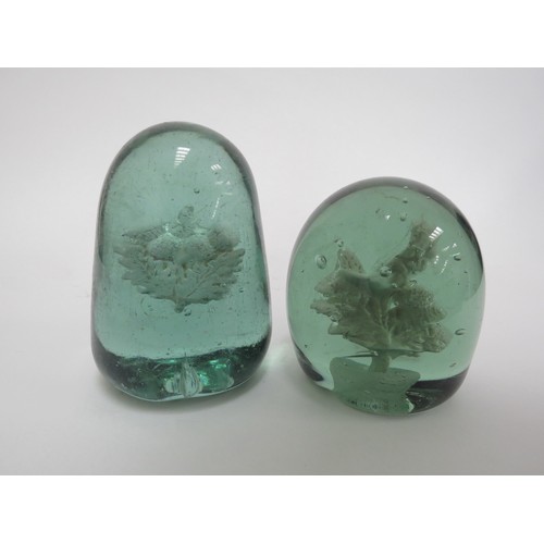 6586 - Two Victorian green glass dumps with plaster inclusions of Scottish Thistle, tallest 11cm